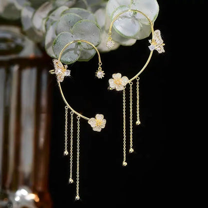 Enkle klipsøreringe med sommerfugle- og blomstermotiver og kvaster – elegante og komfortable, ingen ørepiercing nødvendig.