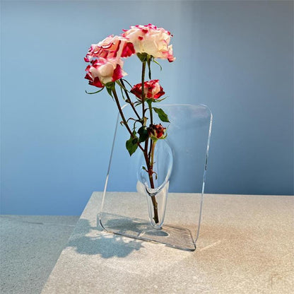 Pladsbesparende og gennemsigtig billedramme-vase med unikt design